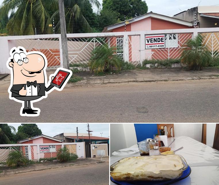 Dê uma olhada a imagem mostrando exterior e mesa de jantar no Oscar Restaurante