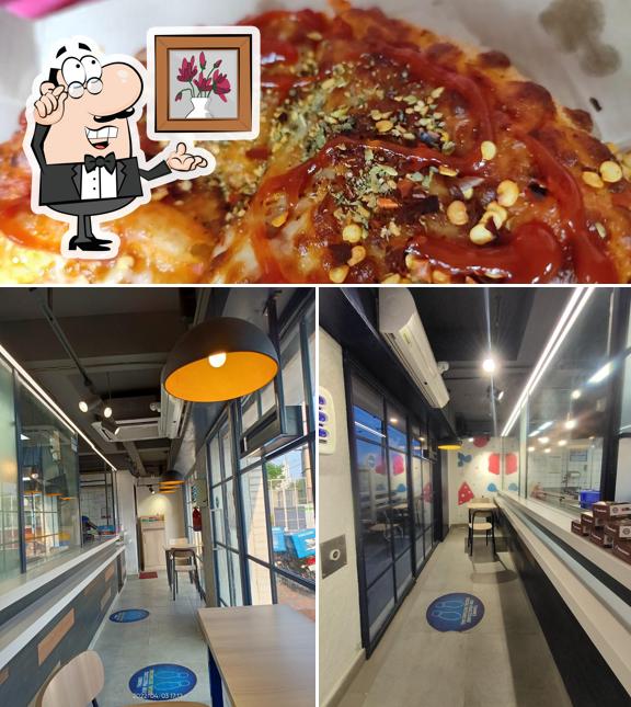 Domino's Pizza is distinguished by interior and pizza