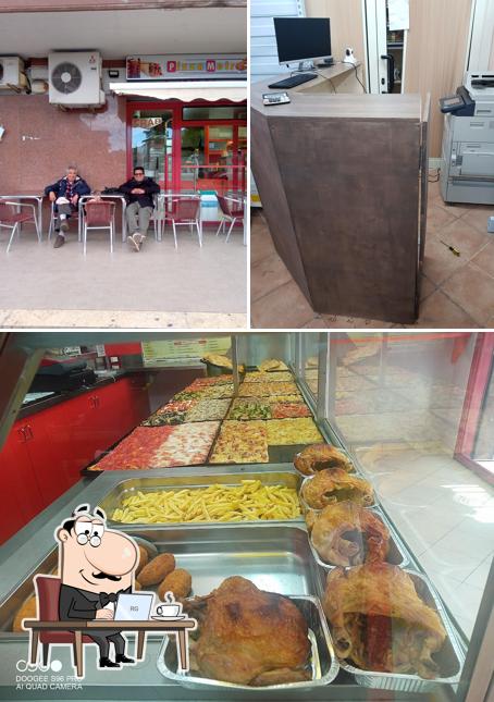 La foto della interni e cibo di Pizza Metro
