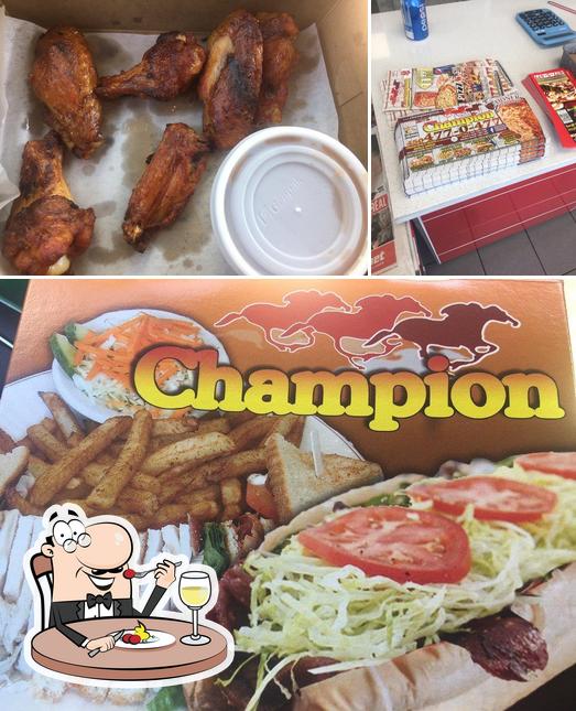 Las fotos de comida y interior en Champion Pizza 2 Pour 1