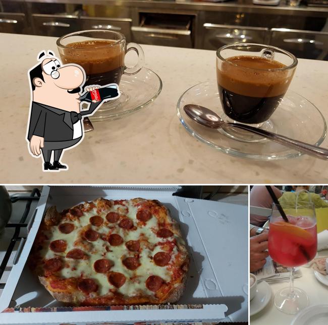 Guarda la immagine che presenta la bevanda e pizza di Duchi Caffè