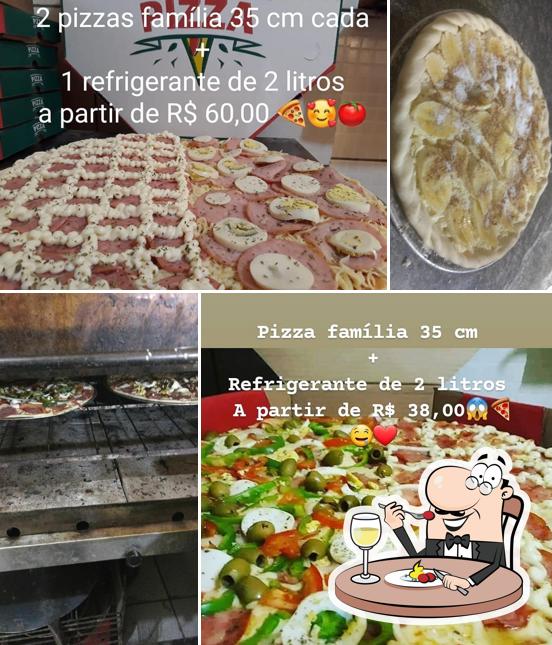 Comida em Pizzaria da Malu