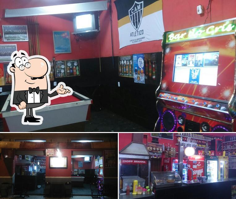 Dê uma olhada a imagem apresentando interior e balcão de bar no Bar Do Cris