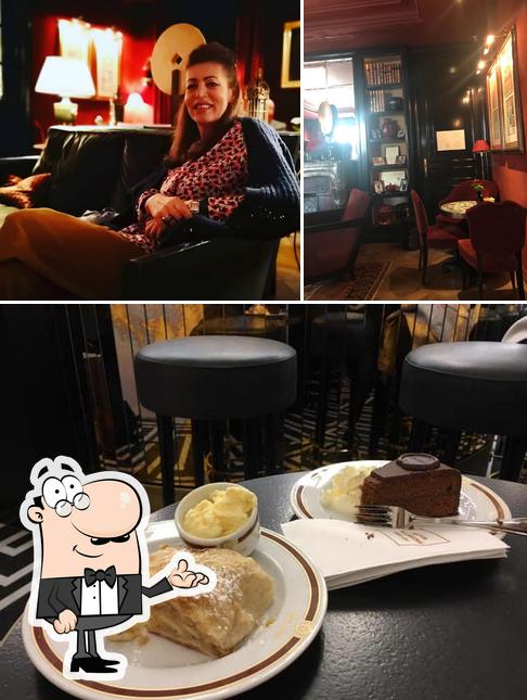 This is the picture showing interior and dessert at Roter Salon (at Hotel Sacher)