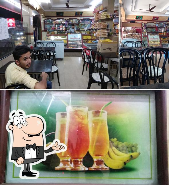 This is the picture displaying interior and beverage at Famous Bakery