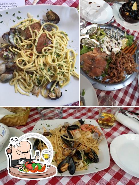 Prenditi la cucina di mare a Ristorante Pizzeria Al Pozzo