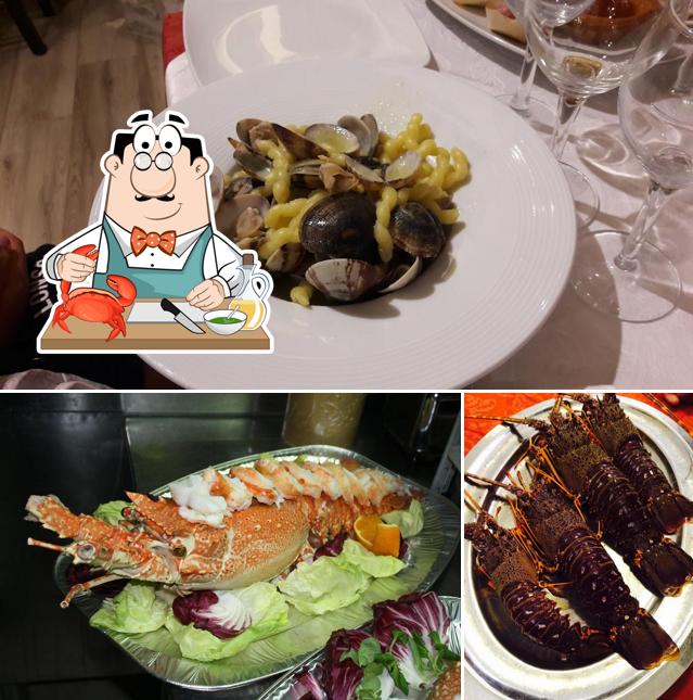 Prenez différents plats à base de fruits de mer disponibles à Osteria di Venere