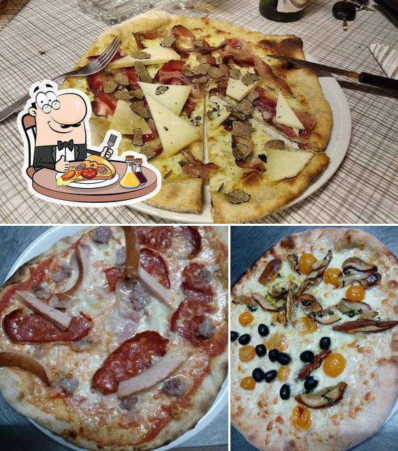Pide una pizza en Asterix Ristorante Pizzeria Osteria Di Tiezzi Marco