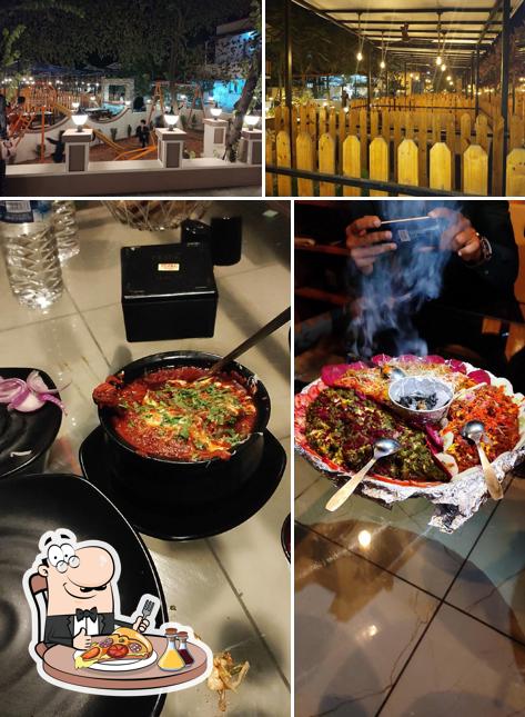 Try out pizza at Dastar-Khan Restaurant