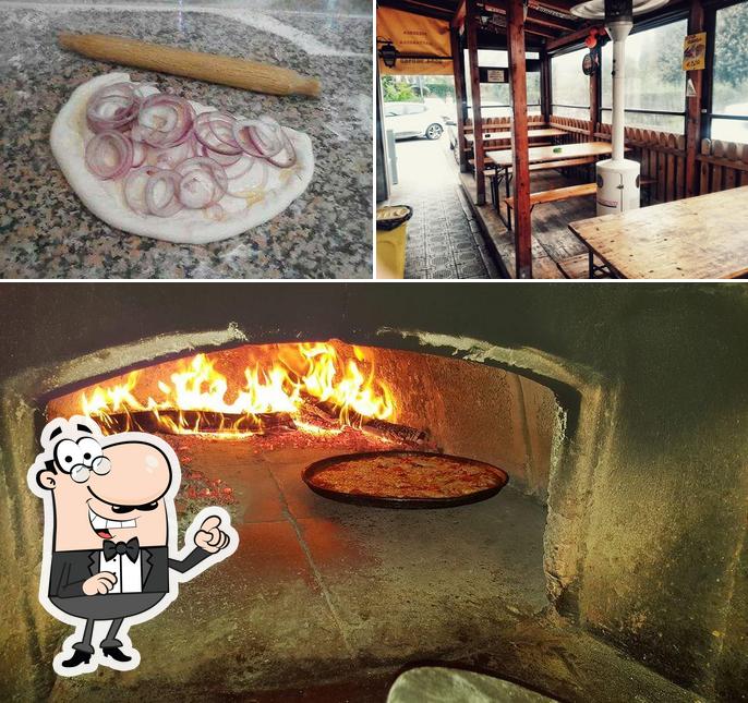 La immagine di interni e cibo da Pizzeria La Gattarella