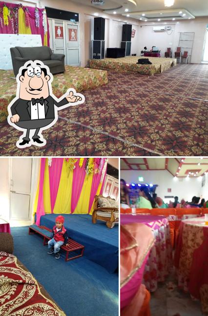 Take a seat at one of the tables at Fatehgarh Marriage Palace