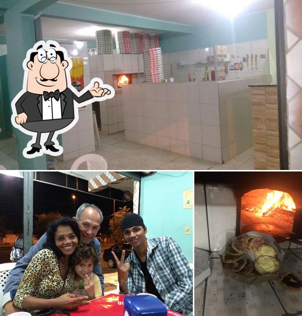 O interior do Pizzaria e Esfirraria Rainha