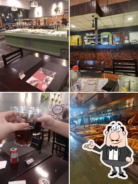 Sente em uma das mesas no Viva Churrascaria
