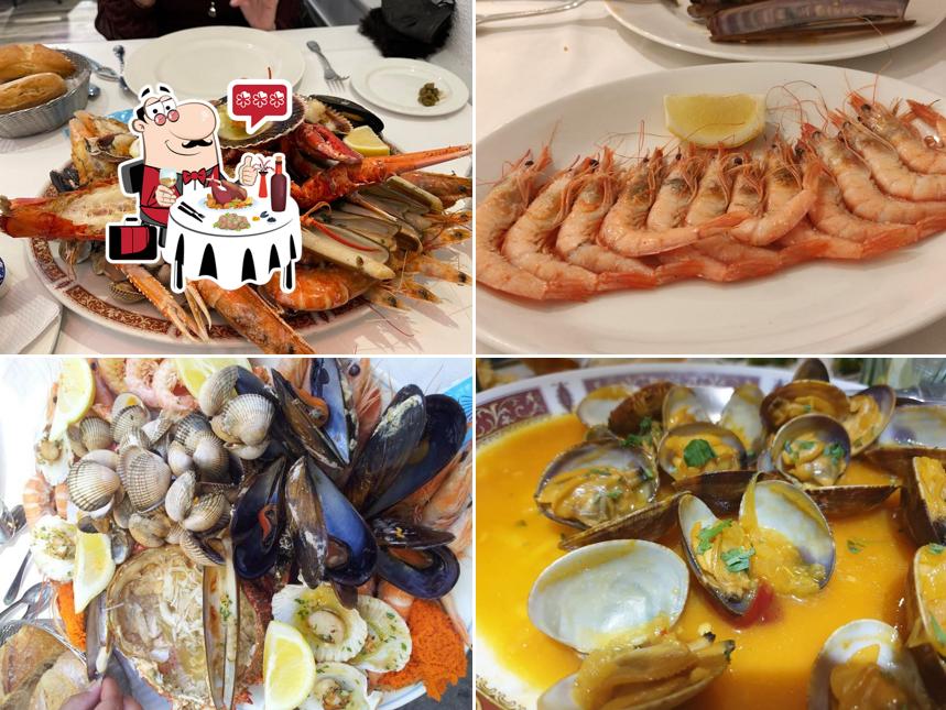 The guests of Compostela Restaurante can taste different seafood items