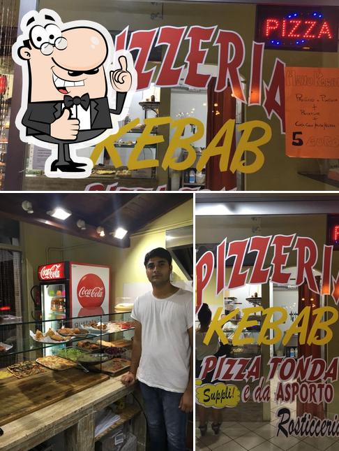 Guarda la foto di Punjabi pizzeria kebab Indian