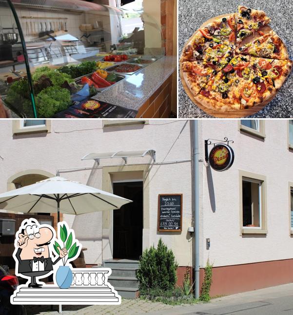 Voici la photo indiquant la extérieur et pizza sur Milan‘s Pizza