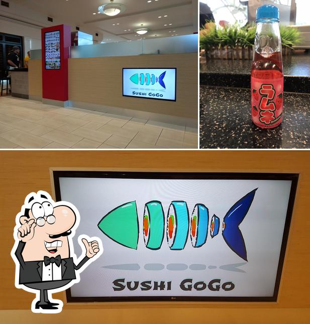 Фотография, на которой видны внутреннее оформление и пиво в Sushi GoGo