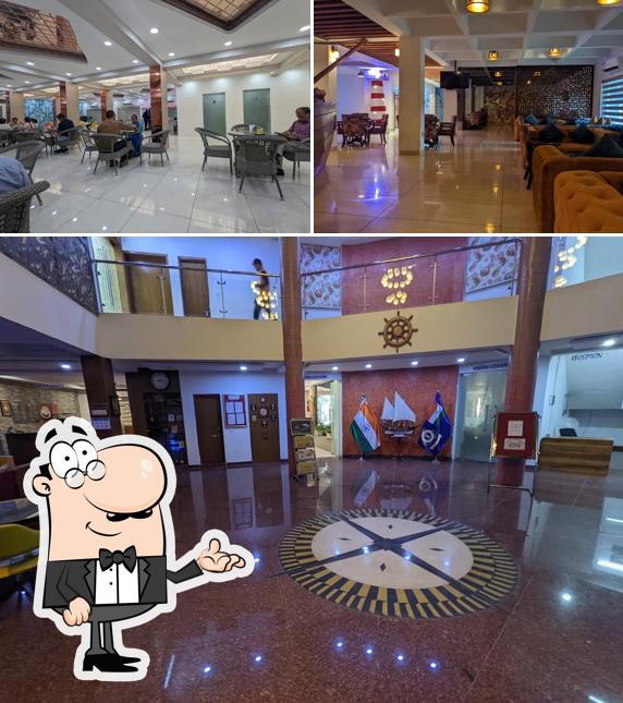 Take a seat at one of the tables at Coast Guard Officers' Mess Annexe