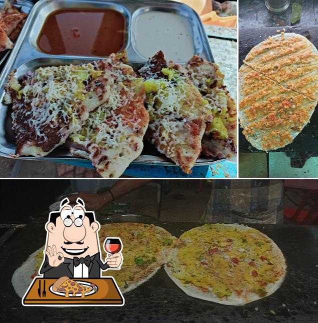 Get pizza at Famous Masala Dosa