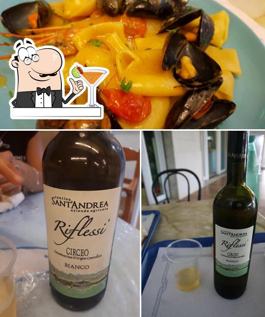 Questa è la immagine che mostra la bevanda e cibo di La Baia Del Pescatore/ L'oasi del pescatore