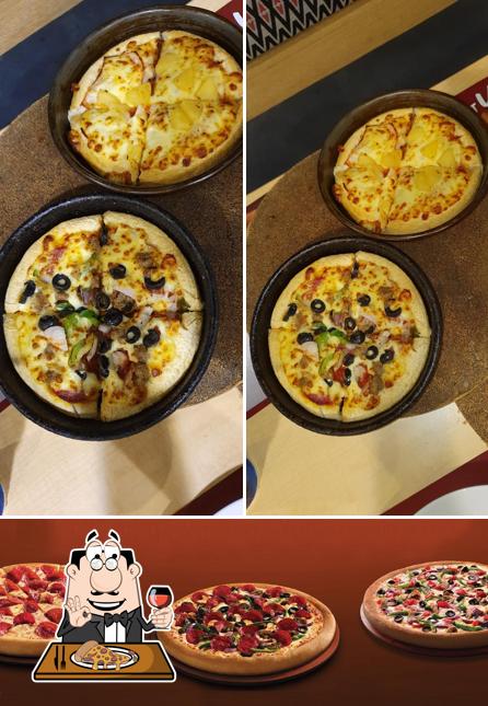 Get pizza at Pizza Hut