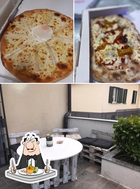 La immagine della cibo e interni di PIZZERIA A MODO MIO