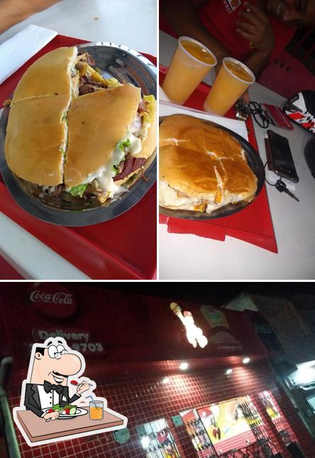 Entre diversos coisas, comida e exterior podem ser encontrados no Tchê Burguer