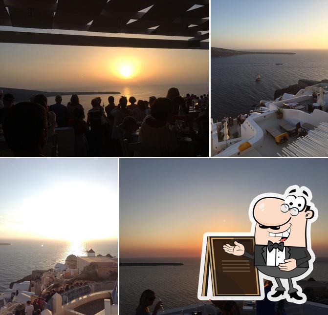 Посмотрите, как "Santorini Sunsets" выглядит снаружи