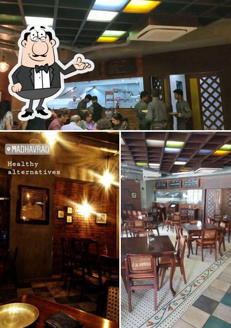 Take a seat at one of the tables at MADHAVRAO