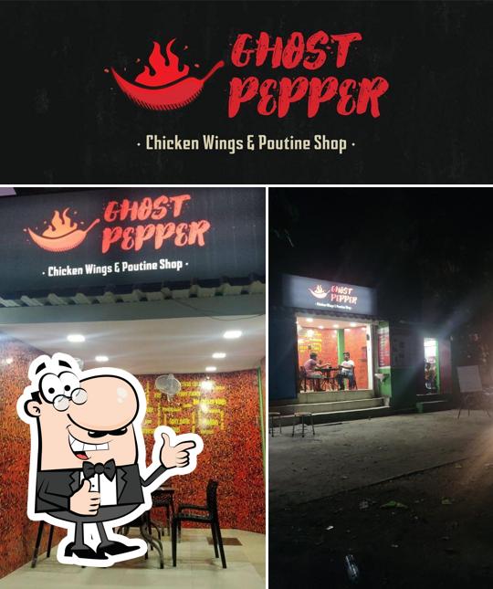 Look at the photo of Ghost Pepper - Chicken wings and poutine shop
