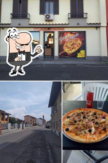 Pizzeria San Rocco di Mohamed Ahmed si caratterizza per la interni e esterno