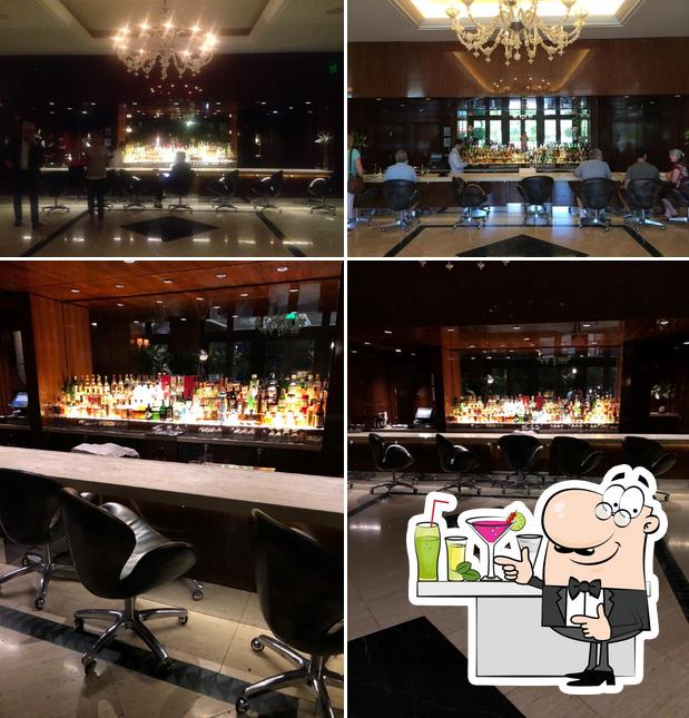 Take a look at the image depicting bar counter and interior at Mr. C Lobby Lounge Bar