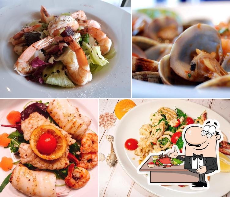 Попробуйте блюда с морепродуктами в "Osteria 99 Italian cuisine"