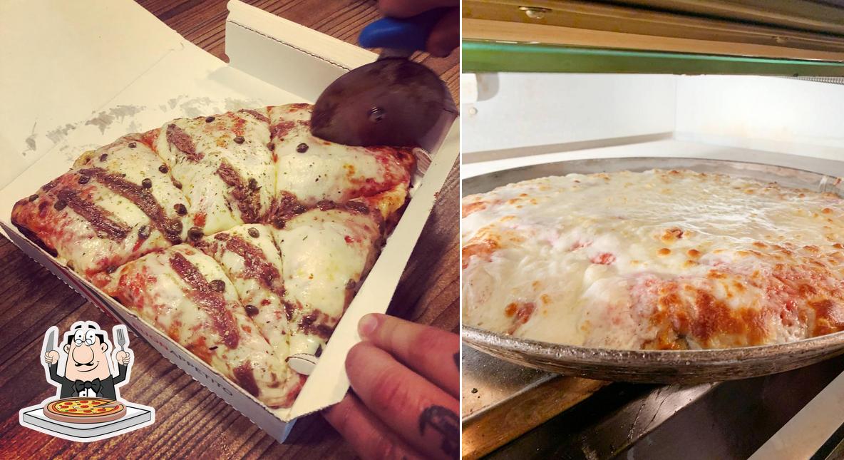 A Pizzeria Molino Pizza al Trancio, puoi assaggiare una bella pizza