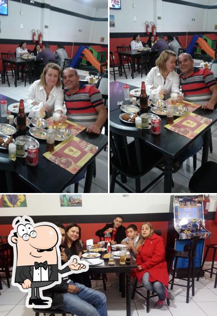 O interior do Frango Americano Delivery