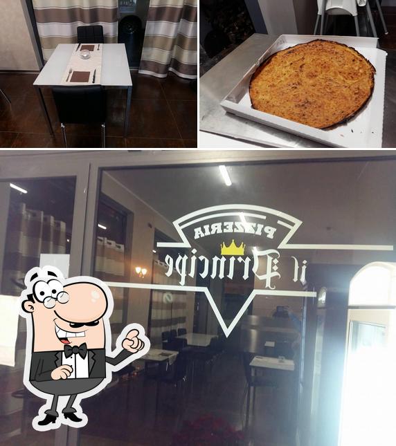 Voici l’image indiquant la intérieur et nourriture sur pizzeria il principe