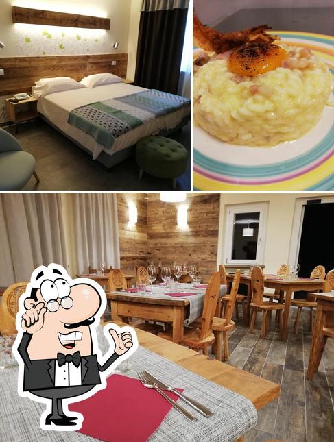 Questa è la foto che raffigura la interni e dolce di Hirondelle Locanda