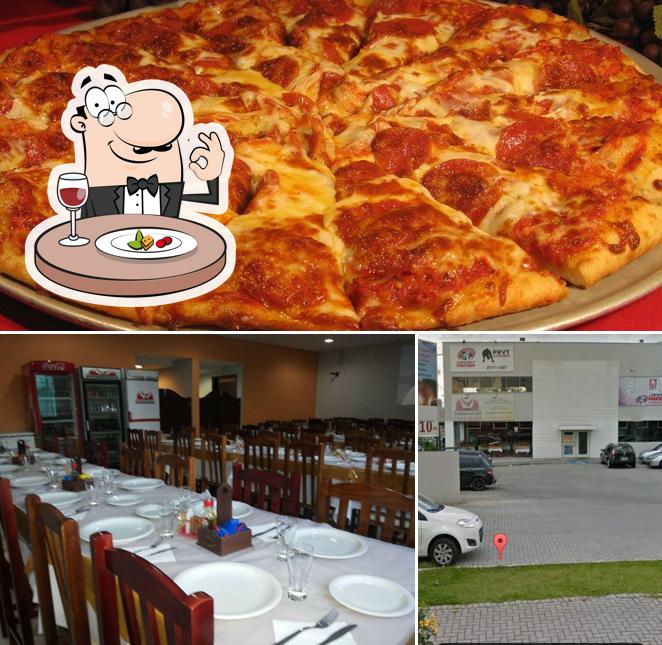 Esta é a imagem mostrando comida e exterior a Marchionale Restaurante e Pizzaria