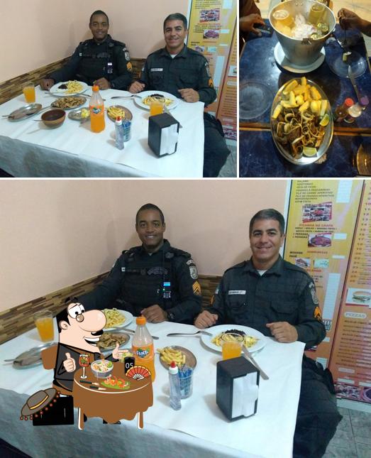 Entre diversos coisas, comida e interior podem ser encontrados a Mister Bella Pizza