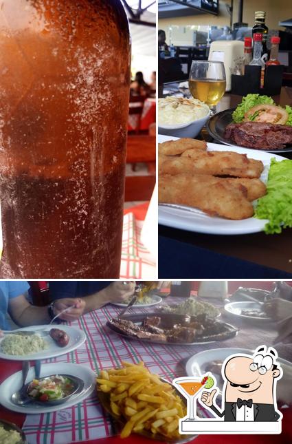 Esta é a foto apresentando bebida e mesa de jantar no Picanha do Alemão