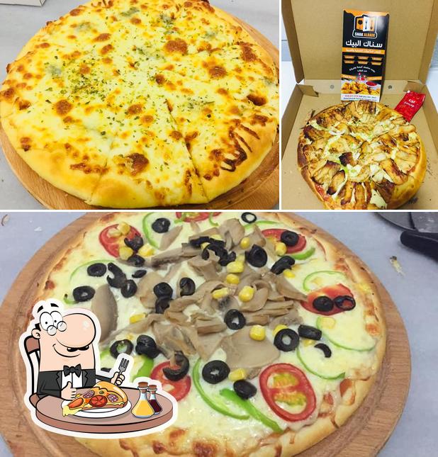 Pide una pizza en مطعم سناك البيك