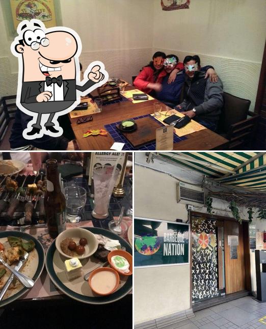 Take a seat at one of the tables at Barbeque Nation