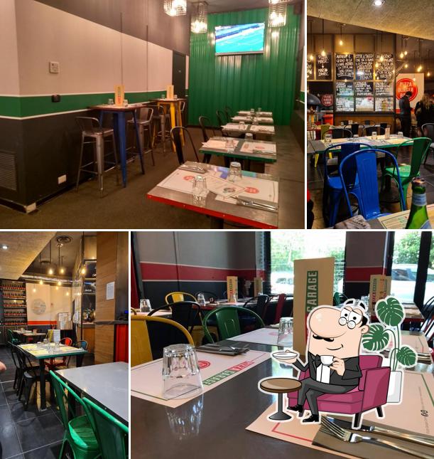 Dai un'occhiata agli interni di Pizza Garage