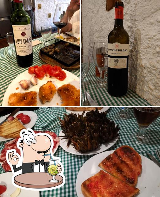 Check out the photo showing drink and food at restaurante EL CALIU DE ESPLUGUES