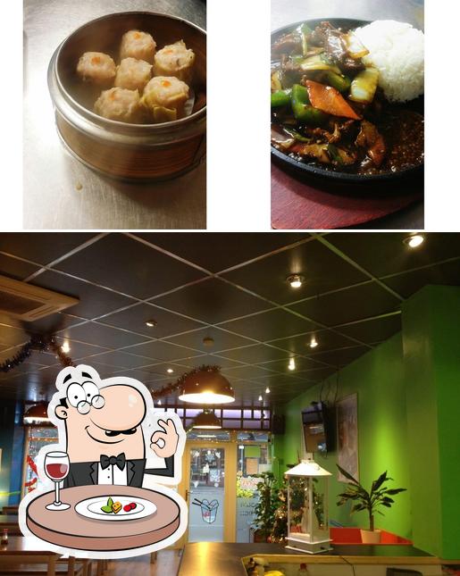 Check out the image displaying food and interior at Dream Wok