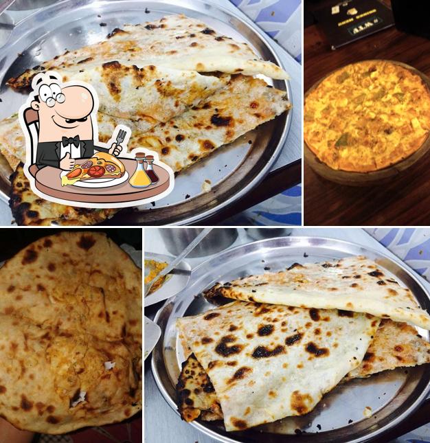 Try out pizza at Mohan Dhaba