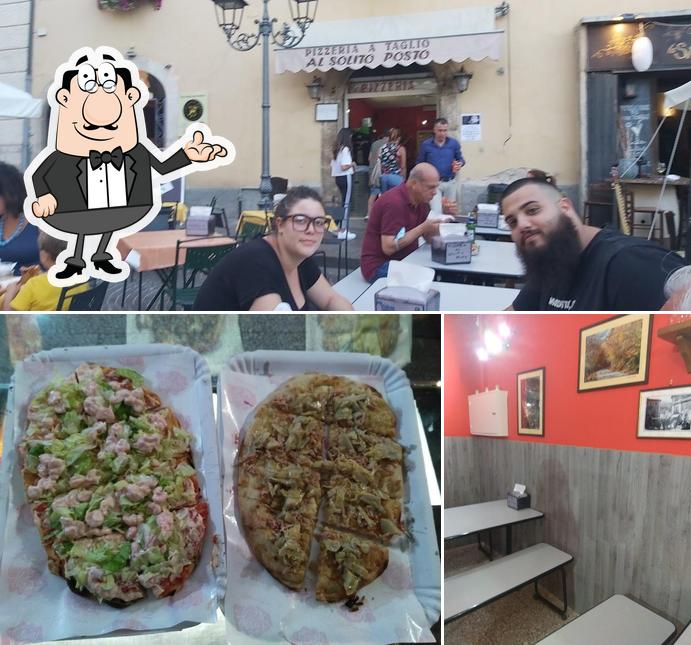 La foto di interni e cibo da Pizzeria Al solito posto