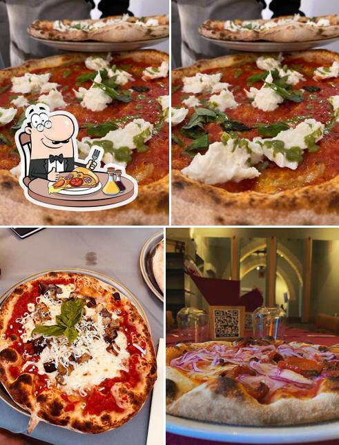 Scegli una pizza a Le Grazie Pizzeria- Ristorante