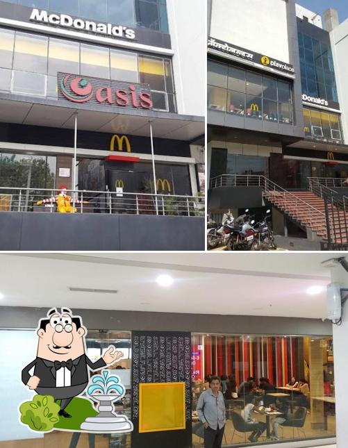 Take a look at the image displaying exterior and interior at McDonald's Take a look at the image displaying exterior and interior at McDonald's