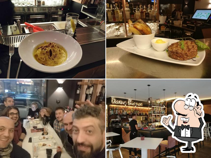 Siediti a un tavolo di Dama Bianca